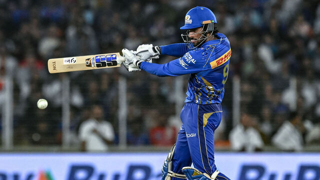 Mumbai Indians' Tilak Varma plays a shot during the Indian Premier League (IPL) Twenty20 second Qualifier cricket match between Punjab Kings and Mumbai Indians at the Narendra Modi Stadium in Ahmedabad on June 1, 2025.