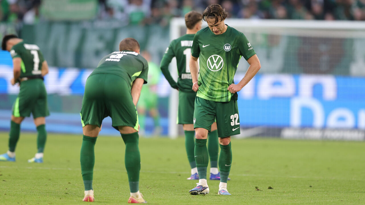 WOLFSBURG, GERMANY - MAY 9: (LR) Denis Vavro of VfL Wolfsburg and Mattias Svanberg of VfL Wolfsburg looks dejected Mattias Svanberg of VfL Wolfsburg (M) after the Bundesliga match between VfL Wolfsburg and FC Bayern München at Volkswagen Arena on May 9, 2026 in Wolfsburg, Germany.