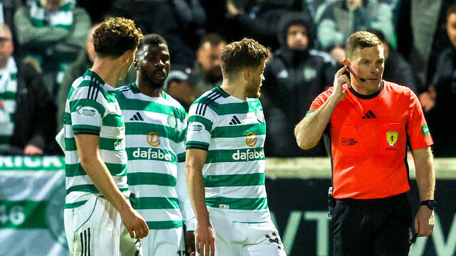 MOTHERWELL, SCOTLAND - MAY 13: Referee John Beaton consults with VAR before awarding Celtic a penalty during a William Hill Premiership match between Motherwell and Celtic at Fir Park, on May 13, 2026, in Motherwell, Scotland.