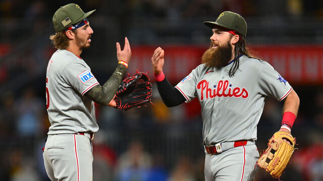PITTSBURGH, PENNSYLVANIA - MAY 15: Brandon Marsh #16 (R) and Bryson Stott #5 of the Philadelphia Phillies celebrate after an 11-9 win over the Pittsburgh Pirates at PNC Park on May 15, 2026 in Pittsburgh, Pennsylvania.