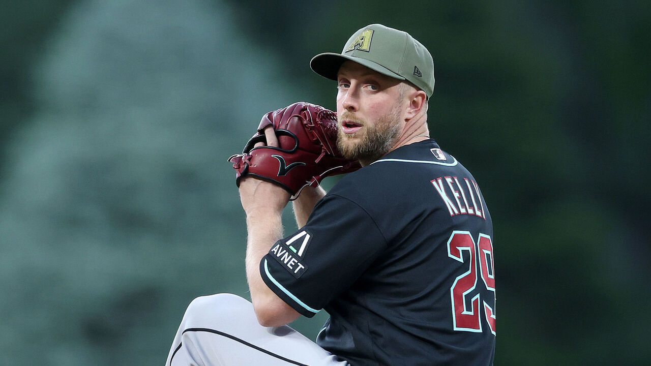 DENVER, COLORADO - MAY 15: Starting pitcher Merrill Kelly #29 of the Arizona Diamondbacks throws against the Colorado Rockies in the first inning at Coors Field on May 15, 2026 in Denver, Colorado.