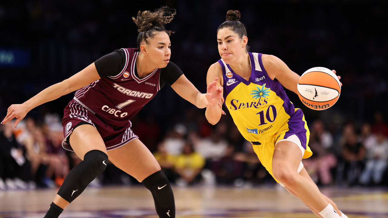 LOS ANGELES, CALIFORNIA - MAY 15: Kelsey Plum #10 of the Los Angeles Sparks plays the ball during the second half against Kiki Rice #1 of the Toronto Tempo at Crypto.com Arena on May 15, 2026 in Los Angeles, California.