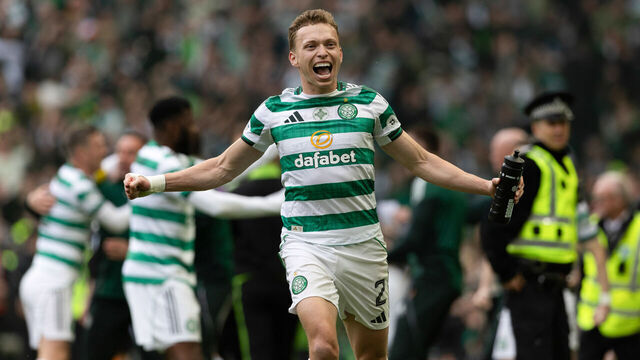 GLASGOW, SCOTLAND - MAY 16: Celtic's Alistair Johnston celebrates after Daizen Maeda scores to make it 2-1 during a William Hill Premiership match between Celtic and Heart of Midlothian at Celtic Park, on May 16, 2026, in Glasgow, Scotland.