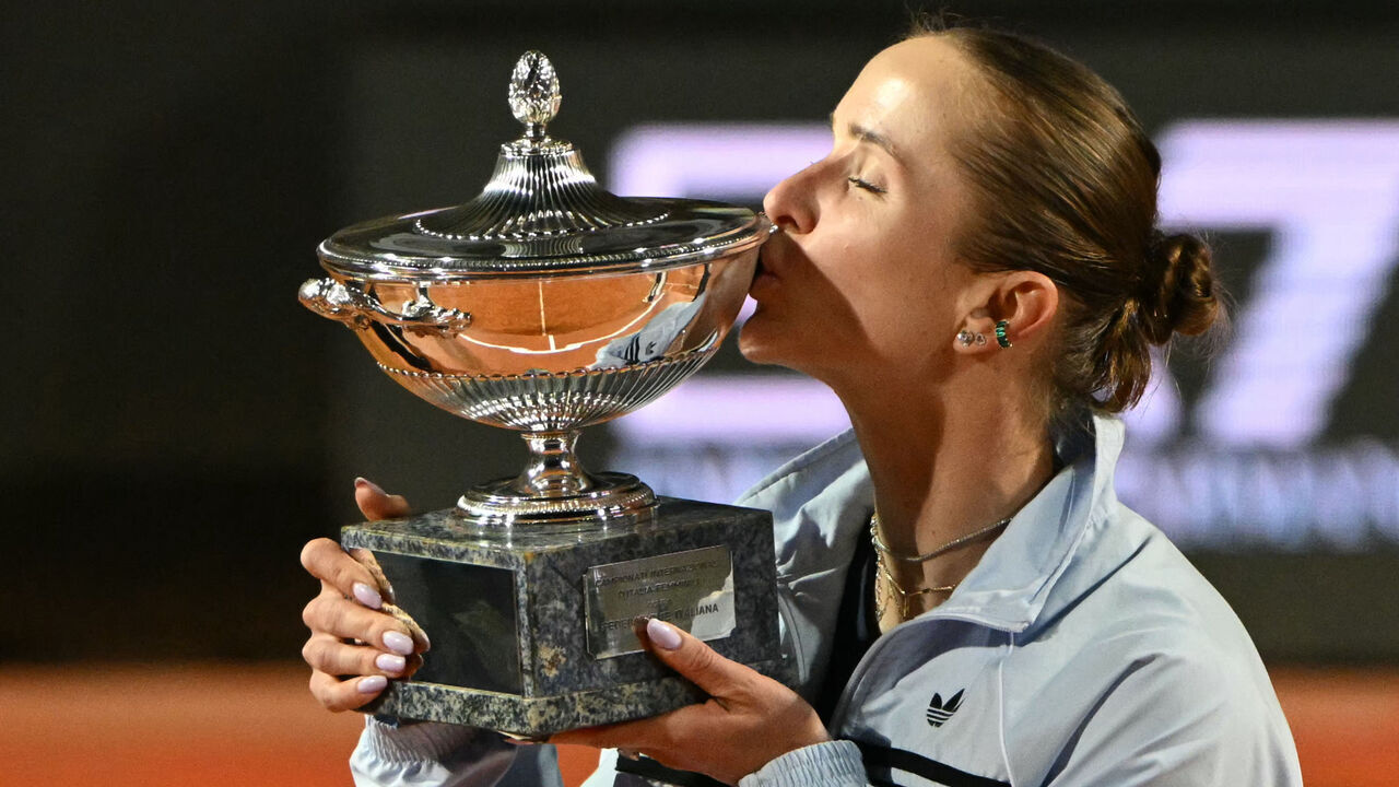 Ukraine's Elina Svitolina kisses the trophy after winning the WTA Rome Open tennis tournament final against USA's Coco Gauff at Foro Italico in Rome on May 16, 2026.