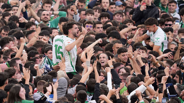 DONOSTIA, SPAIN - MAY 16: Fans of Real Racing Club de Santander celebrate with Andres Martin on the pitch after securing promotion following victory in the LaLiga Hypermotion match between Real Racing Club de Santander and Real Valladolid CF at Campos de Sport de El Sardinero on May 16, 2026 in Donostia, Spain.