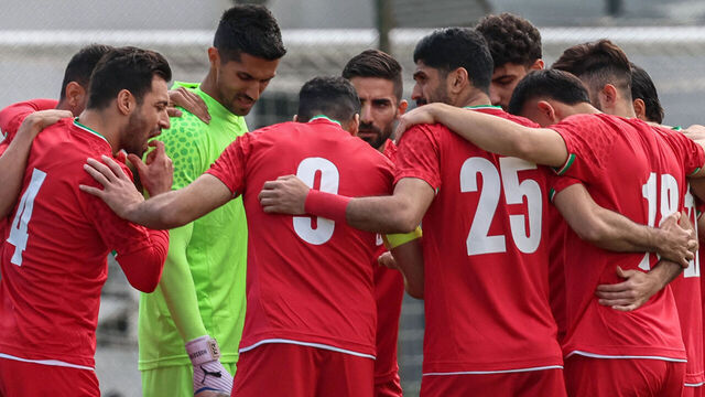 Iran's players gather on the pitch before a friendly football match between Iran and Costa Rica, in Antalya, southern Turkey, on March 31, 2026. FIFA's president told AFP that Iran "will be at the World Cup" despite the Middle East war.
