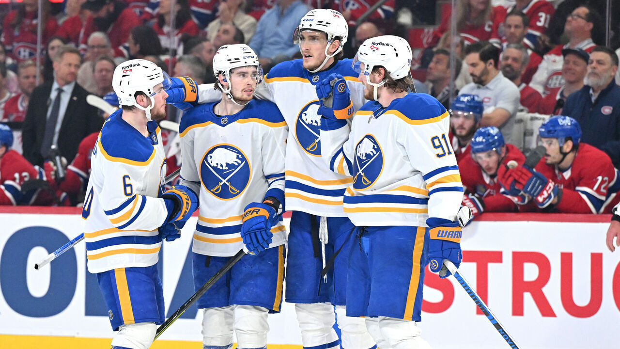 MONTREAL, CANADA - MAY 16: Jack Quinn #22 of the Buffalo Sabres celebrates with teammates after scoring a power play goal during the third period against the Montréal Canadiens in Game Six of the Second Round of the 2026 Stanley Cup Playoffs at Bell Centre on May 16, 2026 in Montreal, Quebec, Canada.