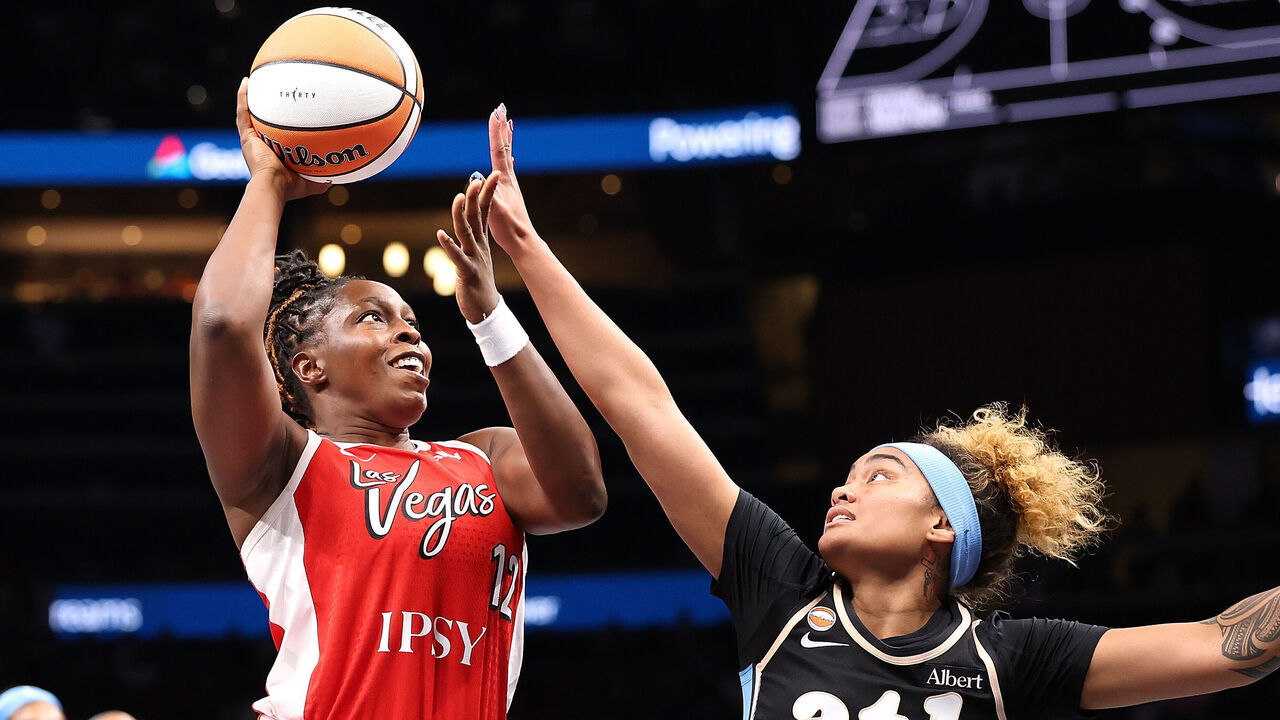 ATLANTA, GEORGIA - MAY 17: Chelsea Gray #12 of the Las Vegas Aces drives against Te-Hina Paopao #2 of the Atlanta Dream during the first quarter at State Farm Arena on May 17, 2026 in Atlanta, Georgia.