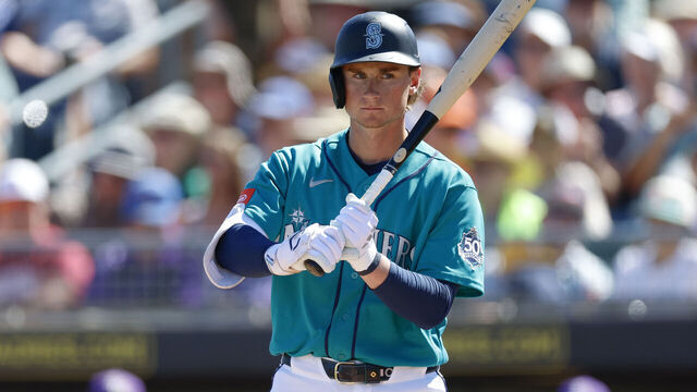 PEORIA, ARIZONA - MARCH 11: Colt Emerson #85 of the Seattle Mariners holds his bat during a Spring Training game against the Colorado Rockies at Peoria Stadium on March 11, 2026 in Peoria, Arizona.