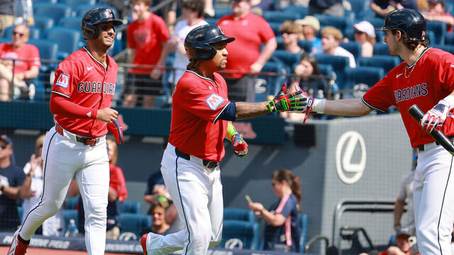 CLEVELAND, OH - MAY 17: Cleveland Guardians right fielder Chase DeLauter (24) greets Cleveland Guardians shortstop Brayan Rocchio (4) and Cleveland Guardians designated hitter Jose Ramirez (11) after Ramirez hit a 2-run home run during the eighth inning of the Major League Baseball interleague game between the Cincinnati Reds and Cleveland Guardians on May 17, 2026, at Progressive Field in Cleveland, OH.