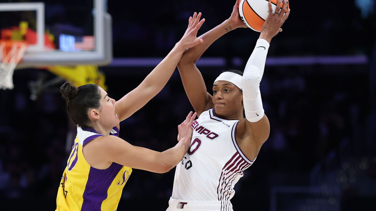 LOS ANGELES, CALIFORNIA - MAY 17: Brittney Sykes #20 of the Toronto Tempo reacts to the defense of Kelsey Plum #10 of the Los Angeles Sparks during the first half at Crypto.com Arena on May 17, 2026 in Los Angeles, California.