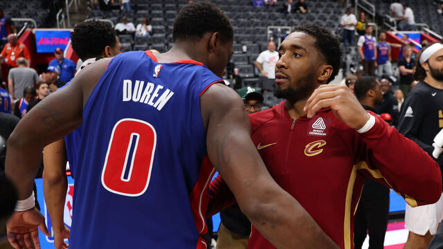 DETROIT, MICHIGAN - MAY 17: Donovan Mitchell #45 of the Cleveland Cavaliers and Jalen Duren #0 of the Detroit Pistons embrace after Game Seven of the Second Round of the NBA Eastern Conference Playoffs at Little Caesars Arena on May 17, 2026 in Detroit, Michigan.