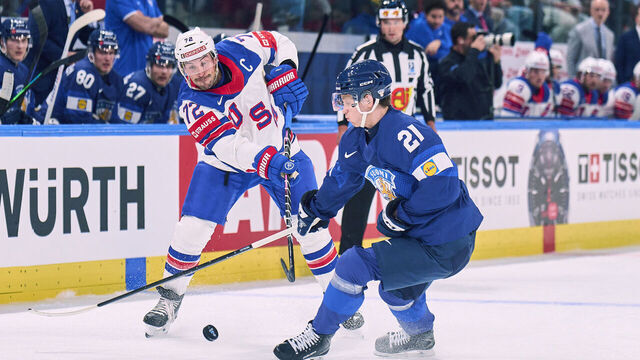 ZURICH, SWITZERLAND - MAY 18: Justin Faulk of Team United States compete and fight for the puck against Patrik Puistola of Finland during the 2026 IIHF Ice Hockey World Championship Switzerland game between Finland and USA at Swiss Life Arena on May 18, 2026 in Zurich, Switzerland.