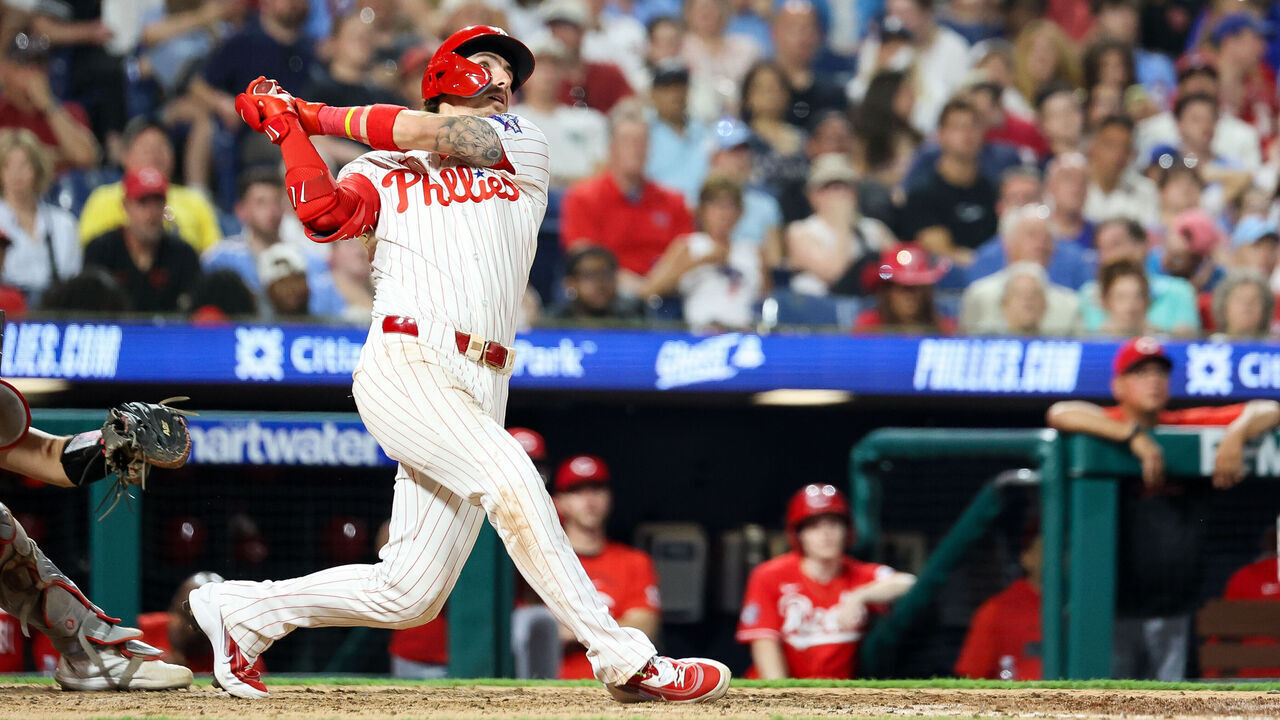 PHILADELPHIA, PENNSYLVANIA - MAY 18: Bryson Stott #5 of the Philadelphia Phillies hits a home run during the eighth inning against the Cincinnati Reds at Citizens Bank Park on May 18, 2026 in Philadelphia, Pennsylvania.