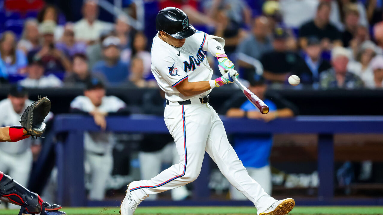 MIAMI, FLORIDA - MAY 18: Javier Sanoja #8 of the Miami Marlins connects for a grand slam in the fifth inning against the Atlanta Braves at loanDepot park on May 18, 2026 in Miami, Florida.