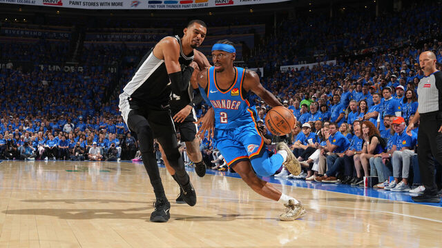 OKLAHOMA CITY, OK - MAY 18: Shai Gilgeous-Alexander #2 of the Oklahoma City Thunder dribbles the ball during the game against the San Antonio Spurs during Game One of the NBA Western Conference Finals on May 18, 2026 at Paycom Center in Oklahoma City, Oklahoma. Mandatory Copyright Notice: Copyright 2026 NBAE