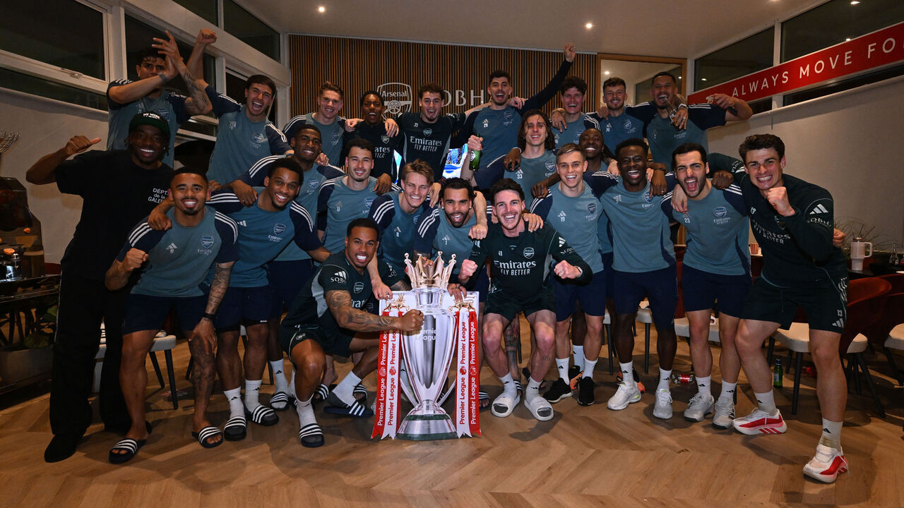 LONDON COLNEY, ENGLAND - MAY 19: The Arsenal players celebrate winning the Premier League after watching AFC Bournemouth v Manchester City at Sobha Realty Training Centre on May 19, 2026 in London Colney, England.