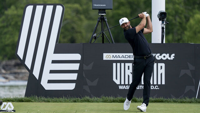 STERLING, VIRGINIA - MAY 10: Dustin Johnson of 4Aces GC takes a tee shot in from of a LIV Golf logo on hole 15 during day 4 of LIV Golf Virginia at Trump National Golf Club on May 10, 2026 in Sterling, Virginia.