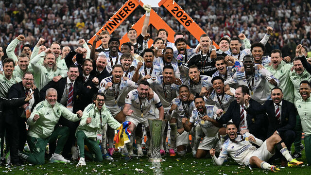 Aston Villa players and staff celebrate with the trophy after winning the UEFA Europa League final football match between SC Freiburg and Aston Villa at Besiktas Park in Istanbul on May 20, 2026.