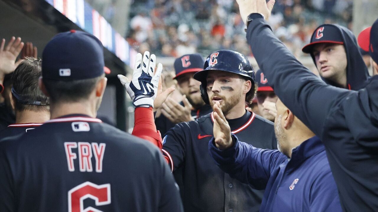 DETROIT, MI - MAY 20: Daniel Schneemann #10 (C) of the Cleveland Guardians celebrates in the dugout after scoring on a groundout by Patrick Bailey to tie the game at 1-1 in the ninth inning at Comerica Park on May 20, 2026 in Detroit, Michigan.