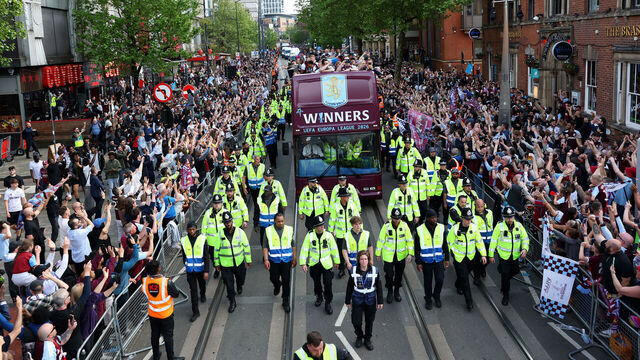 BIRMINGHAM, ENGLAND - MAY 21: A general view as fans line the streets to greet the Aston Villa team bus during the Aston Villa trophy parade on May 21, 2026 in Birmingham, England. Aston Villa defeated SC Freiburg in the UEFA Europa League Final in Istanbul to claim their first European trophy in 44 years.