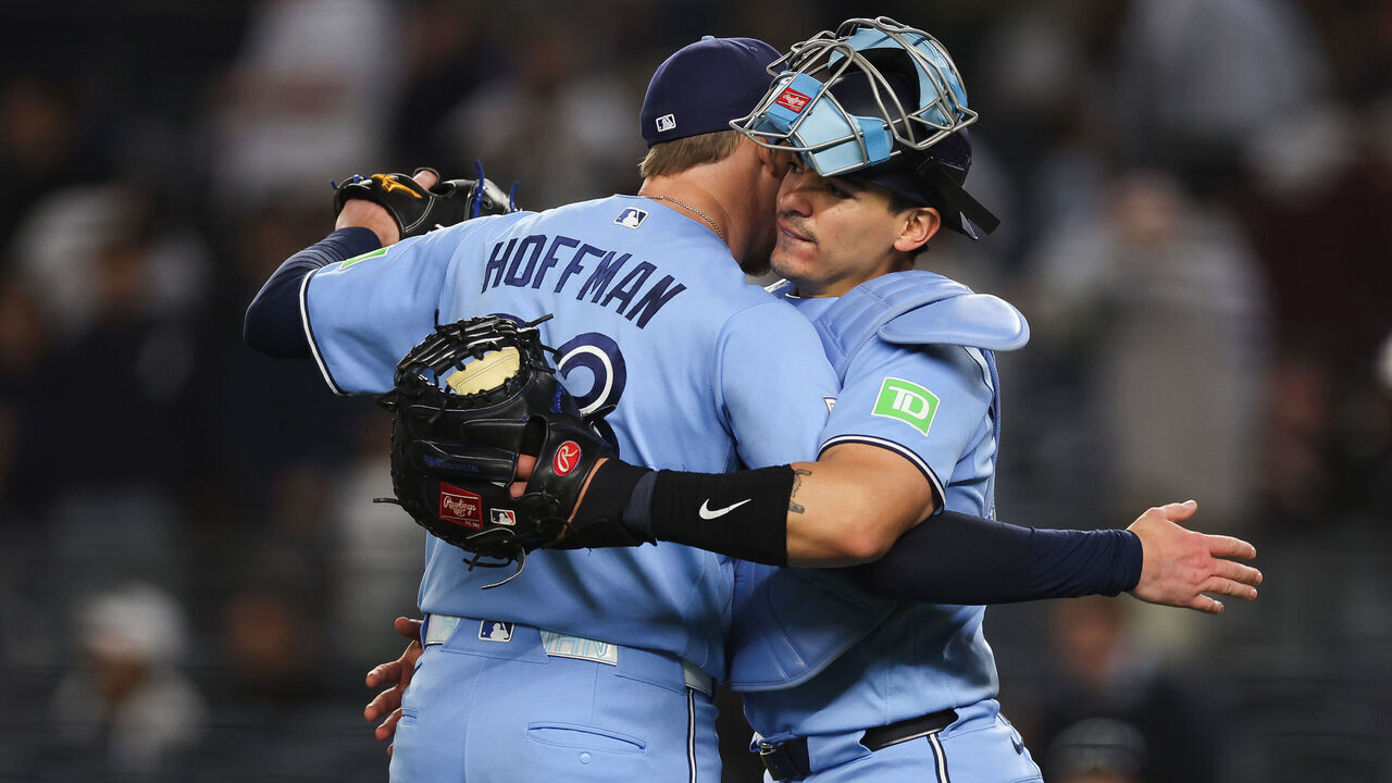 NEW YORK, NEW YORK - MAY 21: Jeff Hoffman #23 and Brandon Valenzuela #59 of the Toronto Blue Jays celebrate after the ninth inning against the New York Yankees at Yankee Stadium on May 21, 2026 in the Bronx borough of New York City. The Toronto Blue Jays won 2-0.