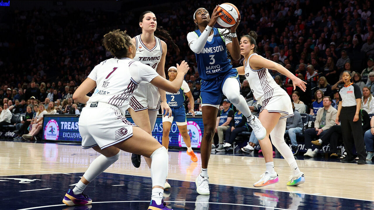 MINNEAPOLIS, MINNESOTA - MAY 21: Maya Caldwell #3 of the Minnesota Lynx goes up for a shot against Kiki Rice #1 of the Toronto Tempo in the fourth quarter at Target Center on May 21, 2026 in Minneapolis, Minnesota. The Lynx defeated the Tempo 100-72.