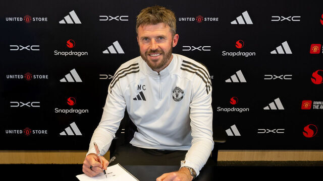 MANCHESTER, ENGLAND - MAY 22: (EXCLUSIVE COVERAGE) Head Coach Michael Carrick of Manchester United poses after signing a contract to remain as Head Coach at Carrington Training Ground on May 22, 2026 in Manchester, England.