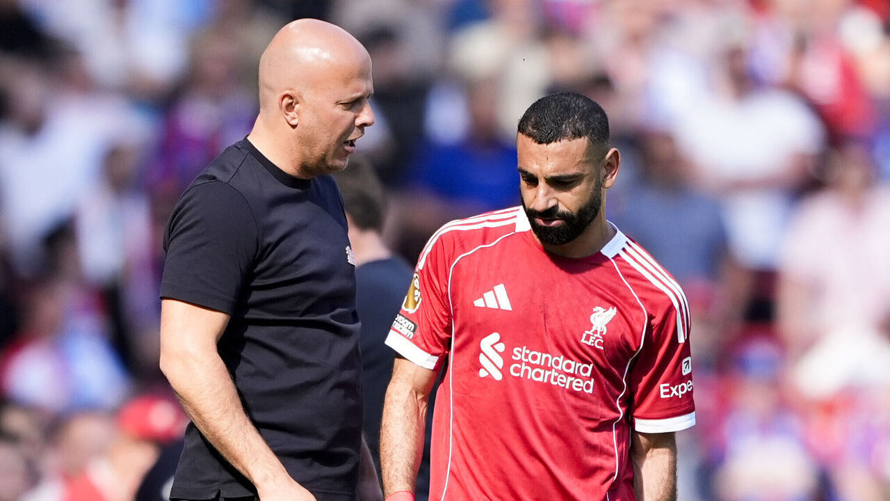 Liverpool's Mohamed Salah with manager Arne Slot after being substituted during the Premier League match at Anfield, Liverpool. Picture date: Saturday April 25, 2026.