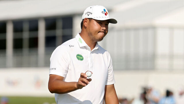 MCKINNEY, TEXAS - MAY 22: Si Woo Kim of the Republic of Korea reacts after making bogey on the 18th green during the second round of THE CJ CUP Byron Nelson 2026 at TPC Craig Ranch on May 22, 2026 in McKinney, Texas.