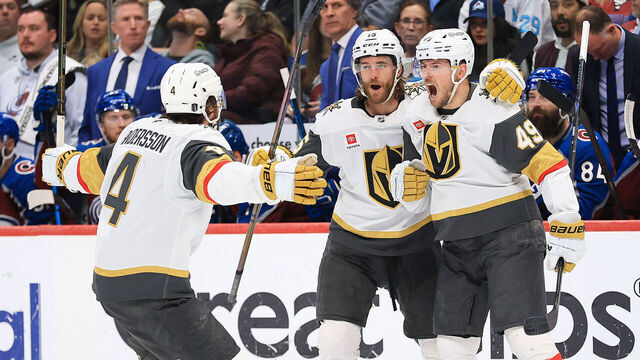 DENVER, COLORADO - MAY 22: Ivan Barbashev #49 of the Vegas Golden Knights celebrates after scoring a goal against the Colorado Avalanche with Rasmus Andersson #4 and Noah Hanifin #15 during the third period in Game Two of the Western Conference Final of the 2026 Stanley Cup Playoffs at Ball Arena on May 22, 2026 in Denver, Colorado.