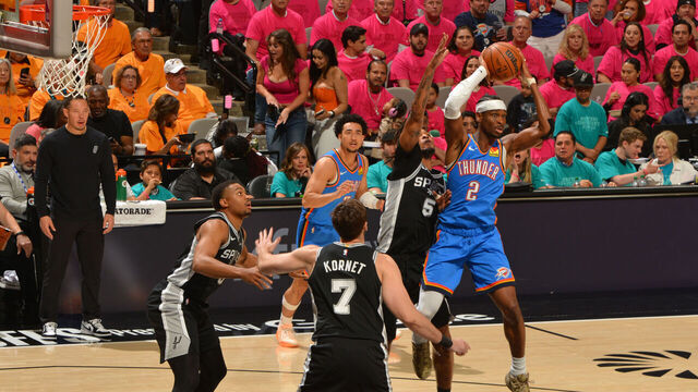 OKLAHOMA CITY, OK - MAY 22: Shai Gilgeous-Alexander #2 of the Oklahoma City Thunder passes the ball during the game against the San Antonio Spurs during Game Three of the NBA Western Conference Finals on May 22, 2026 at Paycom Center in Oklahoma City, Oklahoma. Mandatory Copyright Notice: Copyright 2026 NBAE