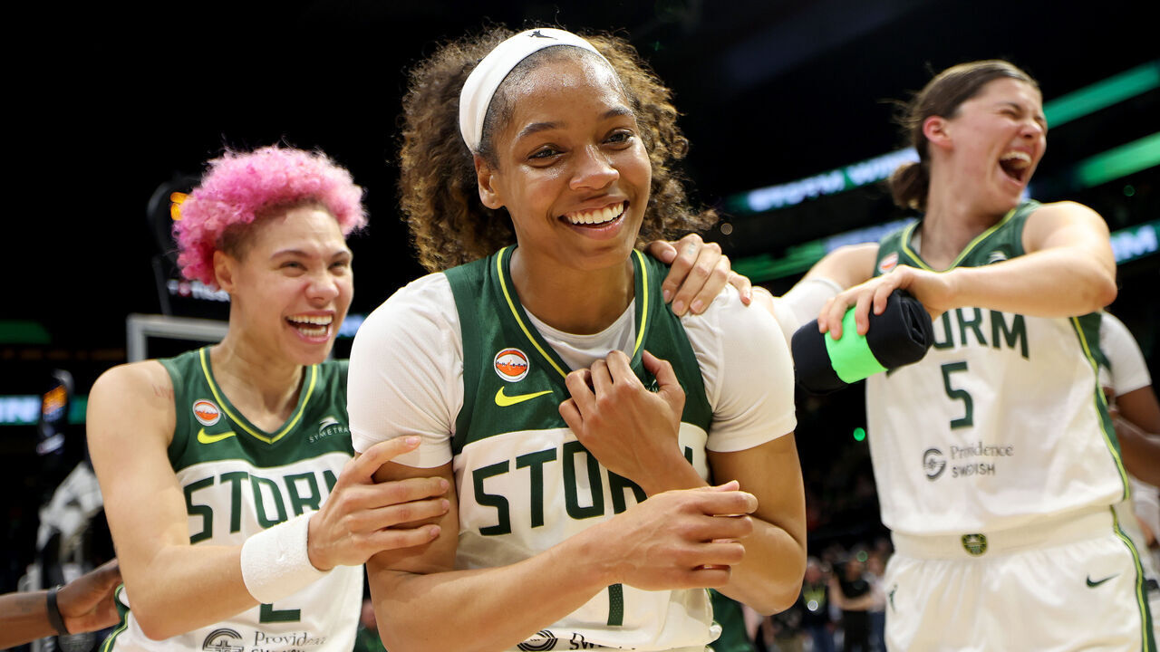 SEATTLE, WASHINGTON - MAY 22: Natisha Hiedeman #2 and Jade Melbourne #5 celebrate with Zia Cooke #7 of the Seattle Storm after beating the Connecticut Sun at Climate Pledge Arena on May 22, 2026 in Seattle, Washington.