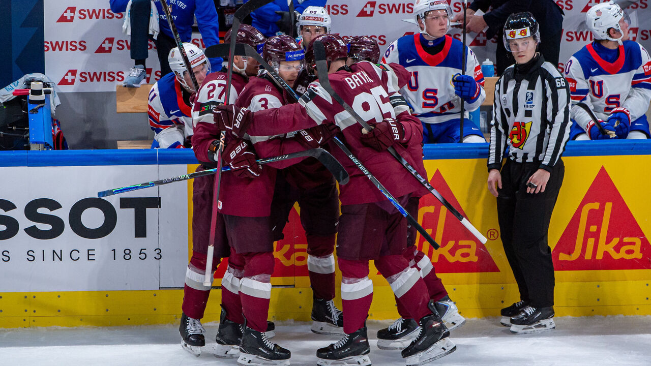 ZURICH, SWITZERLAND - MAY 23: Sandis Vilmanis #23 of Latvia celebrates his goal with teammates during the 2026 IIHF Ice Hockey World Championship Switzerland game between Latvia and USA at Swiss Life Arena on May 23, 2026 in Zurich, Switzerland.