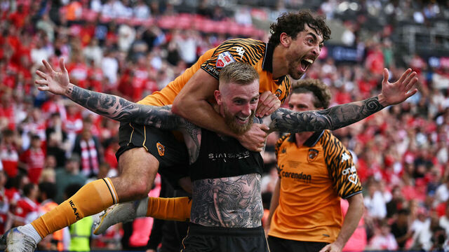 Hull City's Scottish striker #09 Oli McBurnie celebrates scoring the team's first goal during the English Championship play-off final football match between Hull City and Middlesbrough at Wembley Stadium in London on May 23, 2026. / NOT FOR MARKETING OR ADVERTISING USE / RESTRICTED TO EDITORIAL USE
