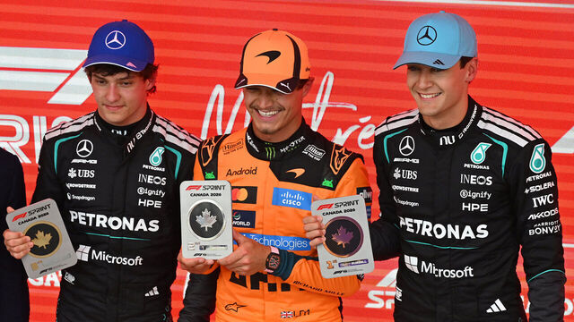 MONTREAL, QUEBEC - MAY 23: Sprint winner George Russell of Great Britain and Mercedes AMG Petronas F1 Team Second placed Lando Norris of Great Britain and McLaren and Third placed Andrea Kimi Antonelli of Italy and Mercedes AMG Petronas F1 Team with their Sprint trophies during the Sprint ahead of the F1 Grand Prix of Canada at Circuit Gilles-Villeneuve on May 23, 2026 in Montreal, Quebec.