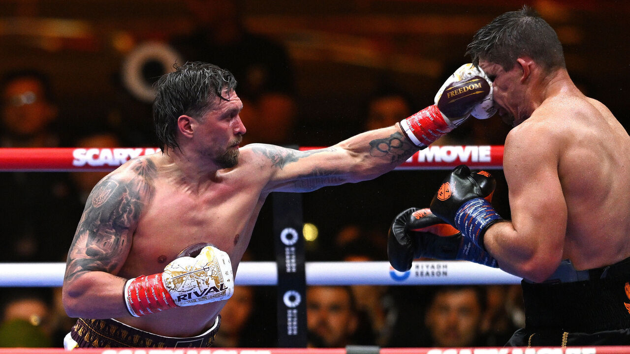 CAIRO, EGYPT - MAY 23: Oleksandr Usyk punches Rico Verhoeven during the WBC and WBA World Heavyweight Titles fight between Oleksandr Usyk and Rico Verhoeven as part of the Glory in Giza Fight Night at Pyramids Panorama 2 on May 23, 2026 in Cairo, Egypt.
