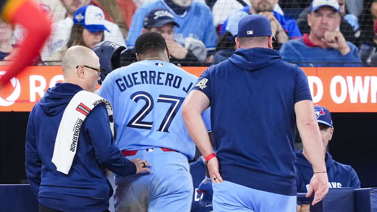TORONTO, CANADA - MAY 24: Vladimir Guerrero Jr. #27 of the Toronto Blue Jays leaves the game after he got hit by a pitch against the Pittsburgh Pirates during the fifth inning in their MLB game at the Rogers Centre on May 24, 2026 in Toronto, Ontario, Canada.