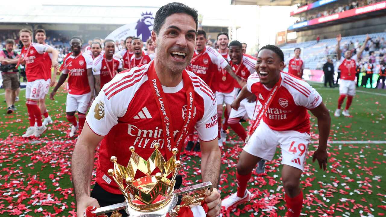 LONDON, ENGLAND - MAY 24: Mikel Arteta, Manager of Arsenal, celebrates with the Premier League trophy, as Arsenal are crowned the Champions of the Premier League for the 2025/26 Season, after the Premier League match between Crystal Palace and Arsenal at Selhurst Park on May 24, 2026 in London, England.