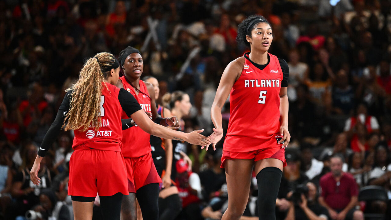 ATLANTA, GA - MAY 24: Angel Reese #5 and Jordin Canada #3 of the Atlanta Dream high five during the game against the Phoenix Mercury on May 24, 2026 at Gateway Center Arena at College Park in Atlanta, Georgia. Mandatory Copyright Notice: Copyright 2026 NBAE