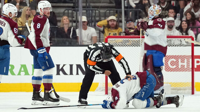 LAS VEGAS, NEVADA - MAY 24: Nathan MacKinnon #29 of the Colorado Avalanche reacts after suffering an injury during the second period against the Vegas Golden Knights in Game Three of the Western Conference Final of the 2026 Stanley Cup Playoffs at T-Mobile Arena on May 24, 2026 in Las Vegas, Nevada.