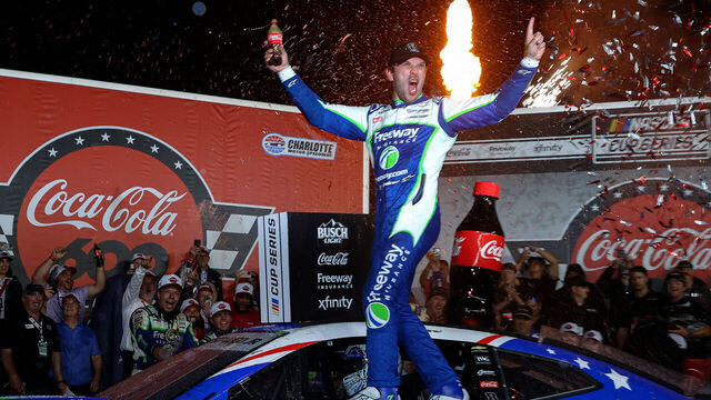 CONCORD, NORTH CAROLINA - MAY 24: Daniel Suarez, driver of the #7 Freeway Insurance Chevrolet, celebrates in victory lane after winning the NASCAR Cup Series Coca-Cola 600 at Charlotte Motor Speedway on May 24, 2026 in Concord, North Carolina.