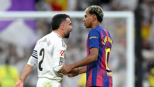 MADRID, SPAIN - OCTOBER 26: Dani Carvajal of Real Madrid clashes with Lamine Yamal of FC Barcelona after the LaLiga EA Sports match between Real Madrid CF and FC Barcelona at Estadio Santiago Bernabeu on October 26, 2025 in Madrid, Spain.