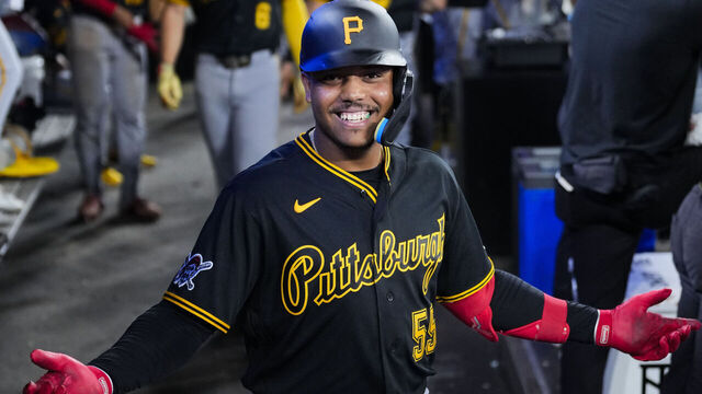 TORONTO, CANADA - MAY 24: Esmerlyn Valdez #55 of the Pittsburgh Pirates celebrates his first MLB career home run against the Toronto Blue Jays in the dugout during the sixth inning in their MLB game at the Rogers Centre on May 24, 2026 in Toronto, Ontario, Canada.