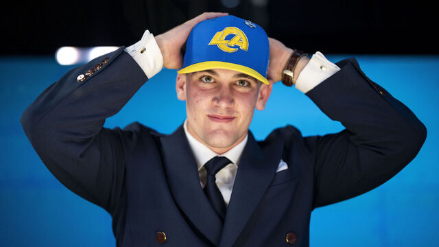 PITTSBURGH, PENNSYLVANIA - APRIL 23: Alabama quarterback Ty Simpson reacts as he puts on a hat after being chosen 13th overall by the Los Angeles Rams in the tunnel during the the first round NFL football draft at Acrisure Stadium on April 23, 2026 in Pittsburgh, Pennsylvania.