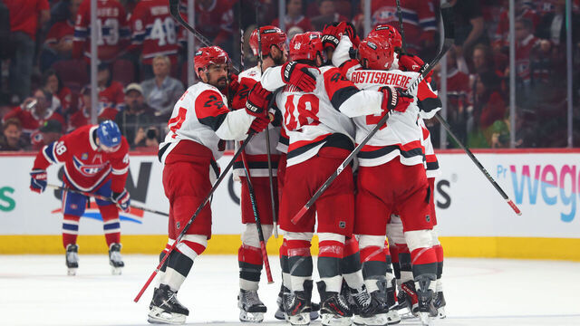 MONTREAL, CANADA - MAY 25: Andrei Svechnikov #37 of the Carolina Hurricanes is congratulated by his teammates after scoring the game-winning goal against the Montréal Canadiens during overtime in Game Three of the Eastern Conference Final of the 2026 Stanley Cup Playoffs at Bell Centre on May 25, 2026 in Montreal, Quebec, Canada.