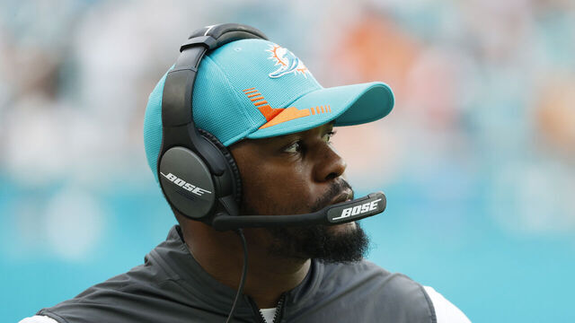 MIAMI GARDENS, FLORIDA - DECEMBER 19: Head coach Brian Flores of the Miami Dolphins looks on from the side line during the game against the New York Jets at Hard Rock Stadium on December 19, 2021 in Miami Gardens, Florida.