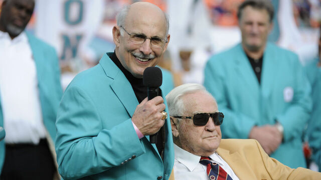 21 December 2014: Former Miami Dolphins player Manny Fernandez stands next to former Miami Dolphins Head Coach Don Shula as Fernandez is inducted into the Miami Dolphins Honor Roll during the NFL football game between the Minnesota Vikings and the Miami Dolphins at the Sun Life Stadium in Miami Gardens, Florida.