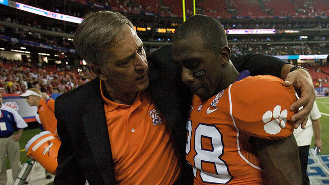 ATLANA, GA - AUGUST 30: Athletic director Terry Don Phillips walks off the field with C.J. Spiller #28 of the Clemson Tigers after the 34-10 loss to the Alabama Crimson Tide at the Georgia Dome on August 30, 2008 in Atlanta, Georgia.