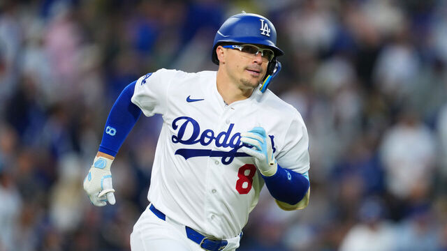 LOS ANGELES, CALIFORNIA - MAY 26: Enrique Hernandez #8 of the Los Angeles Dodgers hits a solo home run during the game between the Los Angeles Dodgers and the Colorado Rockies at Dodger Stadium on May 26, 2026 in Los Angeles, California.